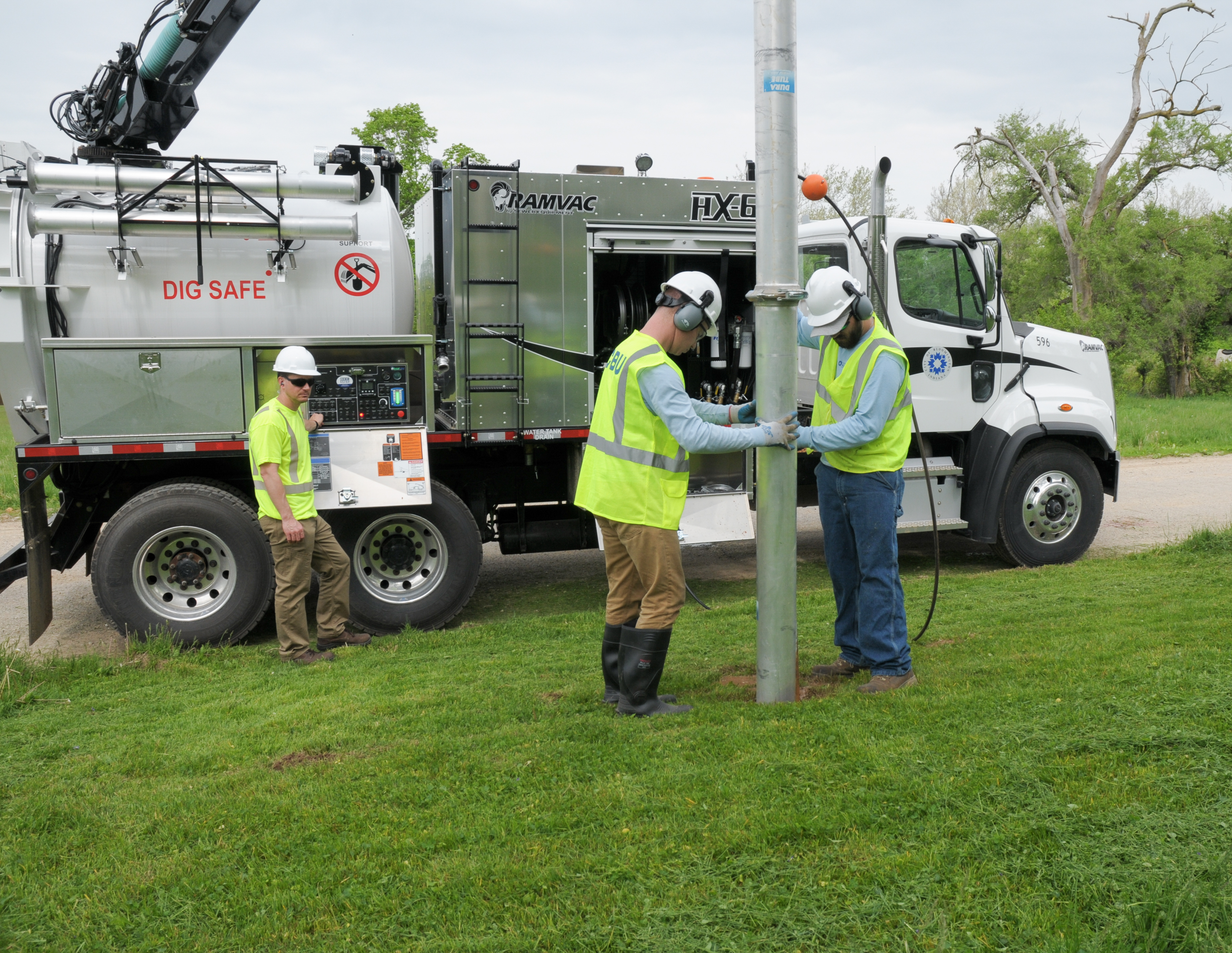 CBU staff using hydro excavator to reveal water pipe