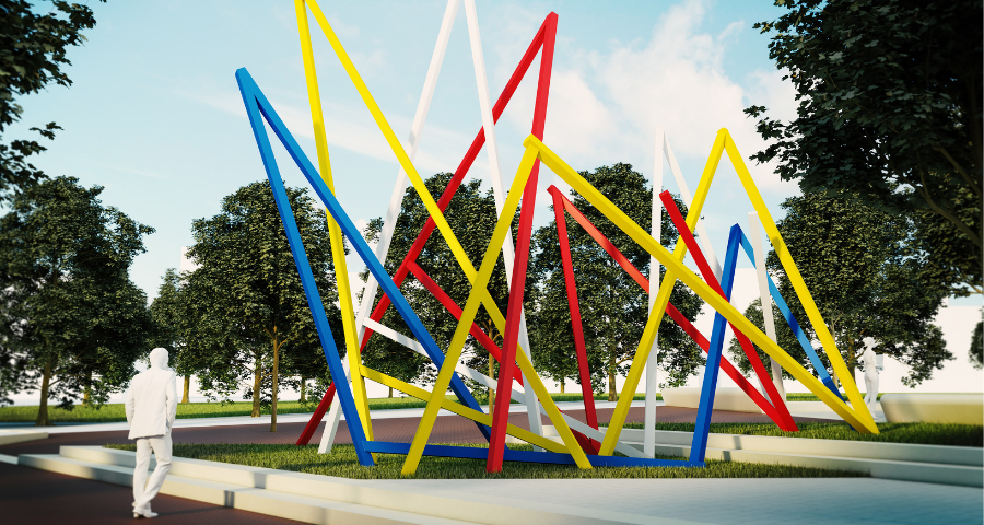 multicolored sticks point into a daytime sky as an art installation 