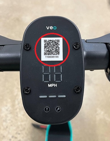 Picture of a QR code circled in red on a VeoRide Scooter