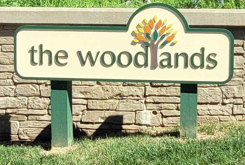 Woodlands entry sign