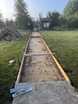 Sidewalk construction near Bloomington Community Orchard