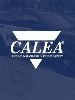 CALEA logo on dark blue background of police vehicle