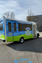 Parks and Recreation's accessible Kid City mini bus showing the accessible entry doors.